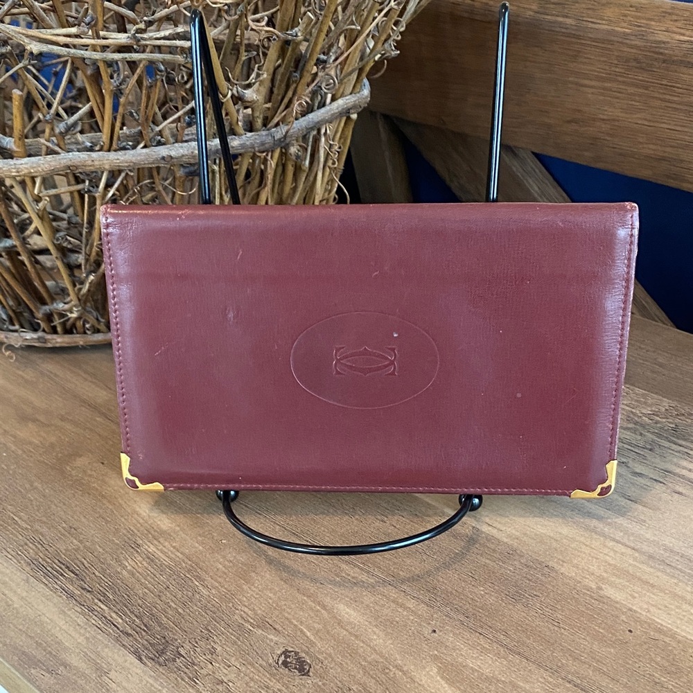 Cartier Must de Cartier burgundy calfskin long wallet